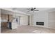 Open living space featuring a kitchen with island and a fireplace at 909 Pine Thicket St., Myrtle Beach, SC 29577