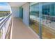 Wide balcony with glass doors opening to condo interior at 9820 Queensway Blvd. # 1210, Myrtle Beach, SC 29572