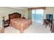 Bedroom featuring a queen bed and ocean views at 9820 Queensway Blvd. # 1210, Myrtle Beach, SC 29572