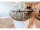 Kitchen island with granite countertop and stylish light fixtures at 9820 Queensway Blvd. # 1210, Myrtle Beach, SC 29572