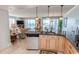 Kitchen area with bar seating overlooking the living area and ocean view at 9820 Queensway Blvd. # 1210, Myrtle Beach, SC 29572