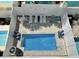 Aerial view of the fenced-in pool and deck, with lounge seating at 113B 15Th Ave. S, Surfside Beach, SC 29575