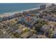 Beautiful ocean view of colorful coastal homes with easy beach access, perfect for a seaside getaway at 113B 15Th Ave. S, Surfside Beach, SC 29575