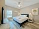Well-lit bedroom featuring a bed, side tables with lamps, and modern decor at 113B 15Th Ave. S, Surfside Beach, SC 29575