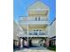 Charming beach house with spacious balconies and covered parking, ideal for coastal living and entertaining at 113B 15Th Ave. S, Surfside Beach, SC 29575