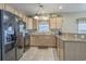 Well-equipped kitchen with stainless steel appliances and ample cabinet space, perfect for culinary enthusiasts at 113B 15Th Ave. S, Surfside Beach, SC 29575