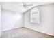 Bright bedroom with neutral carpet, ceiling fan, and large window at 1161 Ganton Way, Myrtle Beach, SC 29588