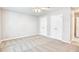 A bright bedroom with carpeted floors and neutral walls features two closets and ceiling fan at 1161 Ganton Way, Myrtle Beach, SC 29588