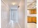 Bright and long hallway connects the kitchen and entrance for easy access at 1161 Ganton Way, Myrtle Beach, SC 29588