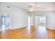 Spacious living room features vaulted ceilings, neutral paint, and wood-look flooring at 1161 Ganton Way, Myrtle Beach, SC 29588