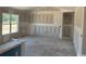 Spacious living room featuring a large window, creating a bright and airy atmosphere in an unfinished home at 1280 Highway 45, Loris, SC 29569