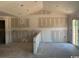 Bright living room with cathedral ceilings and natural light streaming through large sliding glass doors at 1280 Highway 45, Loris, SC 29569