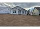 Exterior of home featuring a large, newly seeded backyard at 191 Glengrove Lane, Murrells Inlet, SC 29576