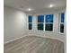 Bedroom features multiple windows providing natural light at 191 Glengrove Lane, Murrells Inlet, SC 29576