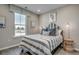 Cozy bedroom with luxury vinyl flooring, natural lighting, and tasteful decor at 191 Glengrove Lane, Murrells Inlet, SC 29576