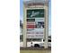 The Shoppes sign displays business names such as Lowes Foods, Pizza Hut, and Quigley's at 191 Glengrove Lane, Murrells Inlet, SC 29576