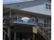 The Pier at Garden City sign showing a yellow umbrella and ocean waves at 191 Glengrove Lane, Murrells Inlet, SC 29576