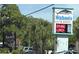 Wahoo's Fish House and Bovine's Restaurant signage with a light blue sky backdrop at 191 Glengrove Lane, Murrells Inlet, SC 29576