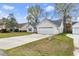 Single Gathering home with a two car garage and driveway in a suburban neighborhood at 445 Saint Charles Circle, Myrtle Beach, SC 29588