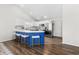 Bright kitchen with a blue island and counter seating at 445 Saint Charles Circle, Myrtle Beach, SC 29588