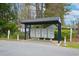Community mailbox area with multiple mailboxes under a covered structure at 445 Saint Charles Circle, Myrtle Beach, SC 29588