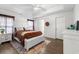 Spacious main bedroom featuring hardwood floors and a tray ceiling at 445 Saint Charles Circle, Myrtle Beach, SC 29588
