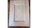 A wooden cabinet door with a recessed panel design, showcasing natural wood grain at 6242 Old Bucksville Rd., Conway, SC 29527