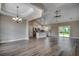 Spacious open-concept living area with modern flooring and abundant natural light at 646 Sunny Pond Ln., Aynor, SC 29511