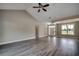 Large living space with high ceilings, wood-look floors and ample natural light at 646 Sunny Pond Ln., Aynor, SC 29511