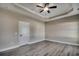 The spacious bedroom with vinyl floors and ceiling fan provides a calm and inviting space at 646 Sunny Pond Ln., Aynor, SC 29511