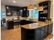 Well-equipped kitchen with granite counters, stainless steel appliances, and modern lighting at 133 Otter Run Rd., Pawleys Island, SC 29585
