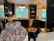 Stylish kitchen with dark cabinets, granite countertops, stainless steel appliances at 133 Otter Run Rd., Pawleys Island, SC 29585