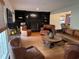 Inviting living room featuring hardwood floors, a fireplace, and a comfortable seating area at 133 Otter Run Rd., Pawleys Island, SC 29585