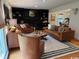 Cozy living room featuring a fireplace, stylish furnishings, and a large window at 133 Otter Run Rd., Pawleys Island, SC 29585