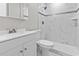 Stylish bathroom featuring a walk-in shower with white marble tile and updated fixtures at 746 Gumbo Limbo Ln., Myrtle Beach, SC 29579