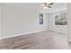 Bright and airy bedroom with hardwood floors, ample natural light, and neutral paint at 746 Gumbo Limbo Ln., Myrtle Beach, SC 29579