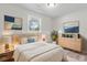 A virtually staged bedroom presents modern decor with a comfortable bed and stylish furnishings at 746 Gumbo Limbo Ln., Myrtle Beach, SC 29579