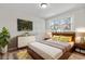 A virtually staged bedroom features stylish decor, including a bed, dresser, and a cozy rug at 746 Gumbo Limbo Ln., Myrtle Beach, SC 29579