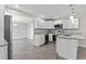 This bright kitchen boasts granite countertops, stainless steel appliances, and an adjacent dining area at 746 Gumbo Limbo Ln., Myrtle Beach, SC 29579