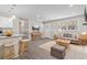 This living room/kitchen features granite counters, modern furnishings and an open floor plan at 746 Gumbo Limbo Ln., Myrtle Beach, SC 29579
