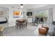 Stylish living room with modern furnishings, a dining area and balcony access at 1 Norris Dr. # 249, Pawleys Island, SC 29585