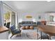 Comfortable living room with modern furniture, stylish decor, and access to outdoor space at 1 Norris Dr. # 249, Pawleys Island, SC 29585