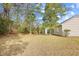 Large backyard with lush trees at 1001 Cardinal Ct., Murrells Inlet, SC 29576