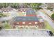 An aerial view of the apartment complex with surrounding trees and parking at 1025 Carolina Rd. # O4, Conway, SC 29526
