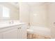 Well-lit bathroom with a tub and shower combo and a single sink vanity at 1025 Carolina Rd. # O4, Conway, SC 29526
