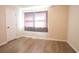 This is a bedroom featuring wood floors and a window with curtains at 1025 Carolina Rd. # O4, Conway, SC 29526