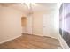 The bedroom features wood flooring, a ceiling fan, and neutral-colored walls at 1025 Carolina Rd. # O4, Conway, SC 29526