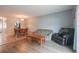 Open living area with wood and tile flooring features a dining area and comfortable seating at 1025 Carolina Rd. # O4, Conway, SC 29526