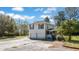 Two-car garage and screened-in porch with home at 103 N Magnolia Ave., Andrews, SC 29510