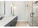 Modern bathroom features double vanity sinks with black fixtures, and a walk-in tiled shower at 105 Serenity Point Dr., Little River, SC 29566